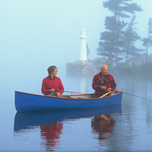 Retired Couple Fishing in Canoe